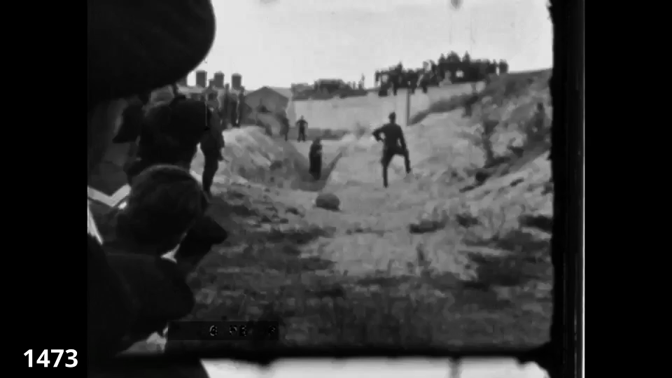 Screenshot from the Wiener Film mass execution in Liepaja 1942 fc 1473 - Jews being shot in a pit